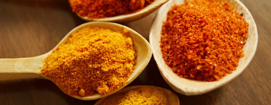 Ground Turmeric Curcumin And Other Spices In Wooden Spoon Health Benefits