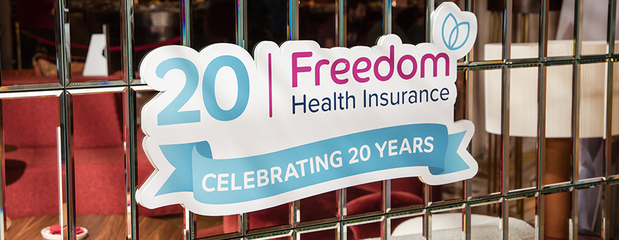 Freedom Health Insurance 20th anniversary logo