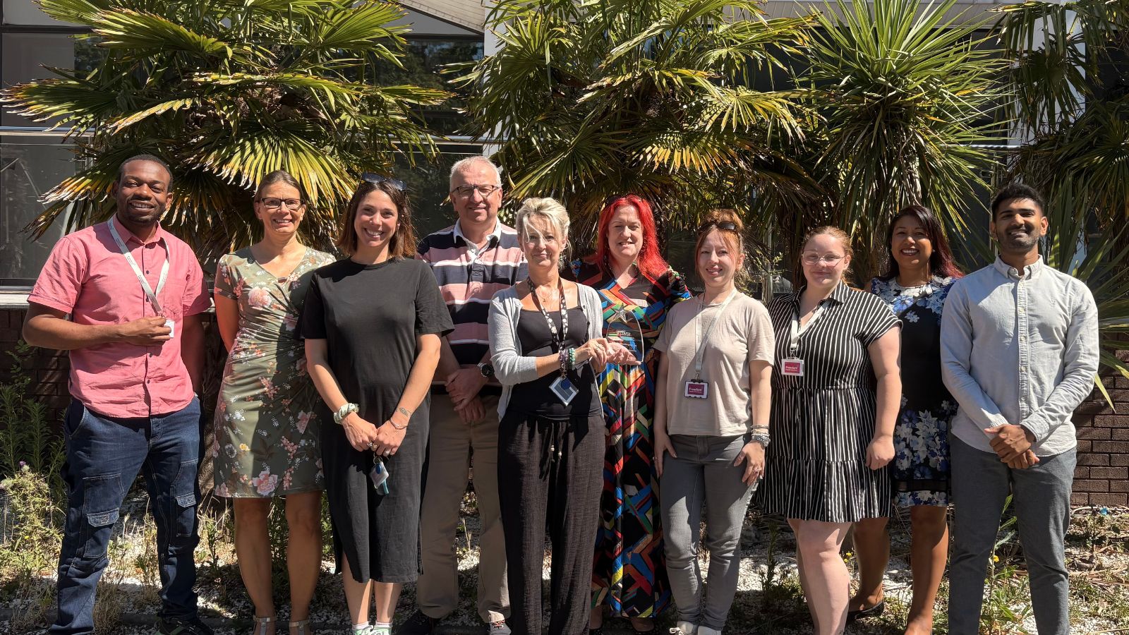 Some of the Freedom Health Insurance claims team outside the office in Poole