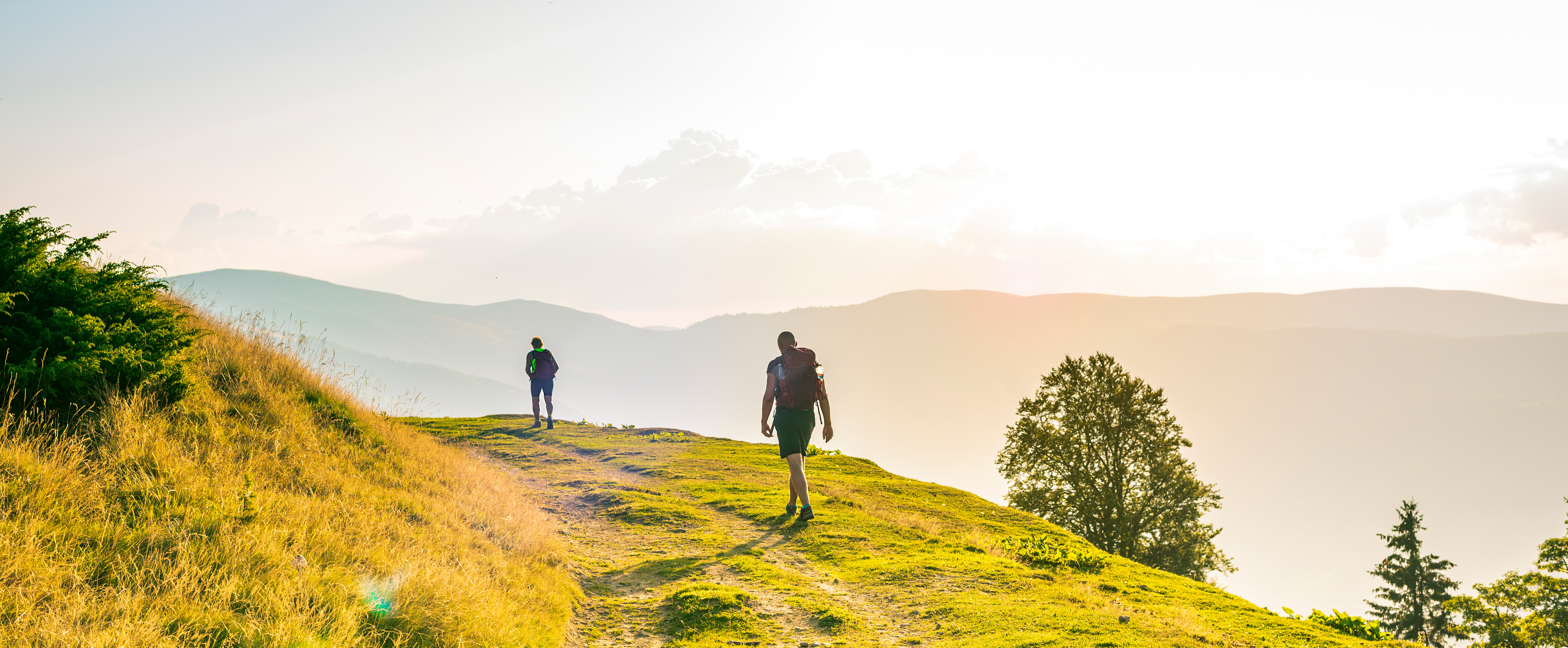 Man and women uphill walking