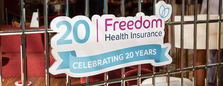 Freedom Health Insurance 20th anniversary logo