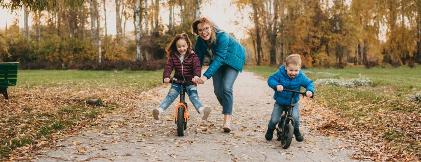 Women with family on autumn bikeride