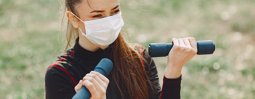 Young Women Wearing White Face Mask Working Out Lifting Weights Outdoor Exercising